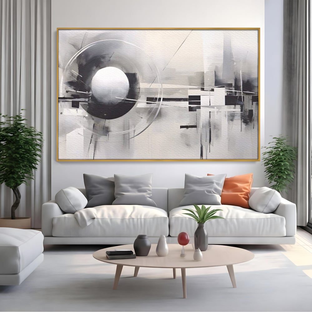 Tablou canvas cu pictura abstracta cu sfera si cercuri, in rama de aluminiu auriu, pe perete intr-un living